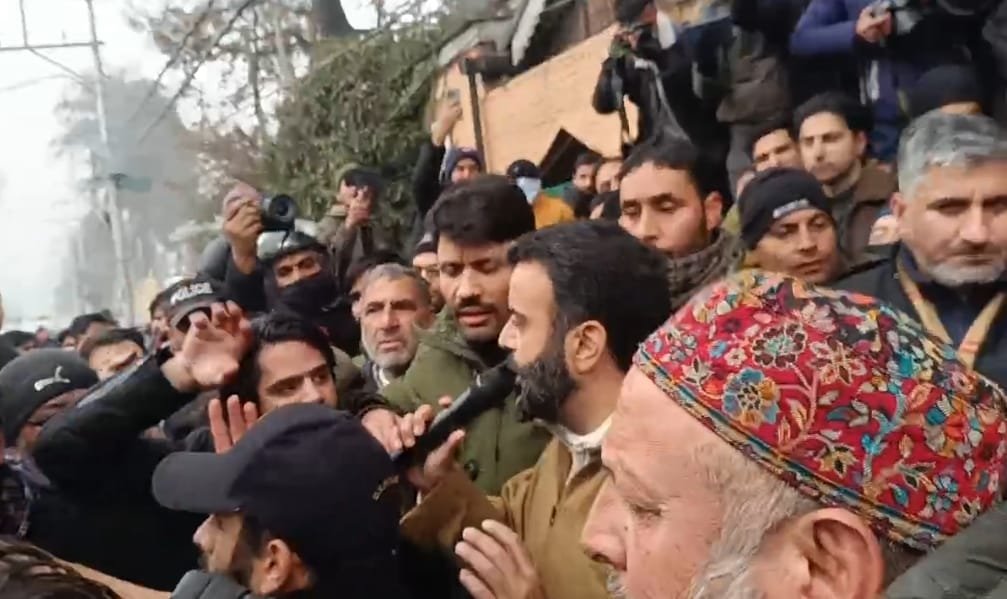 NC MP Ruhullah Mehdi leads youth protest against reservation policy outside CM Omar’a residence in Sgr